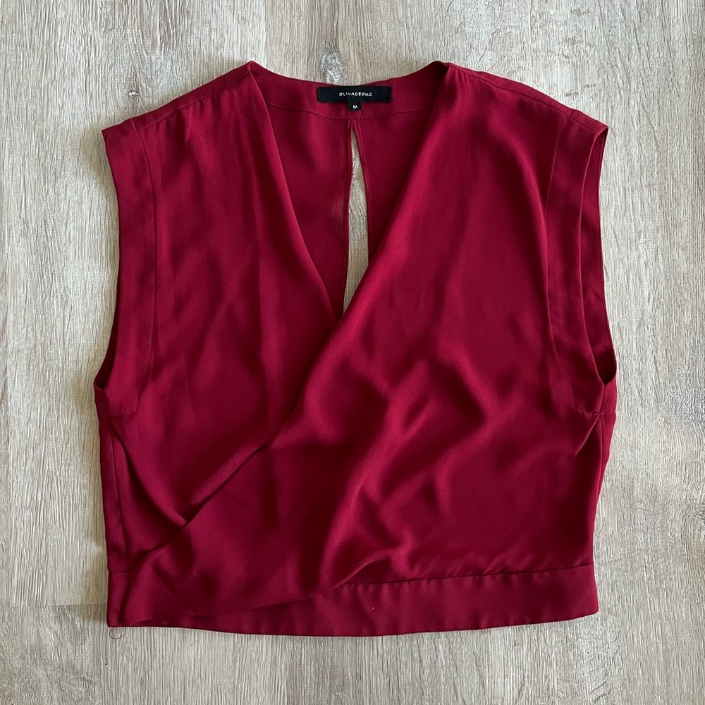 Red V-neck open back top Size M